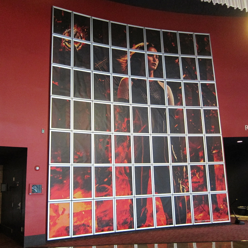 THE HUNGER GAMES:  CATCHING FIRE backlit wall at the ArcLight Beach Cities in Southern California.